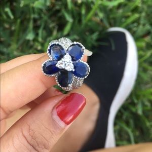 Sapphire and diamond flower estate ring platinum